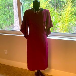 Milky dress with asymmetrical sleeves in plum rurple